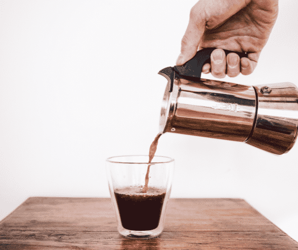 A gorgeous coffee accessory pouring a great cup of coffee at home to save money