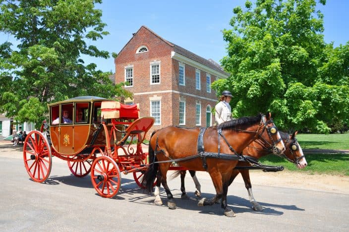 a horse drawn carriage in colonial williamsburg, a great place for a romantic getaway