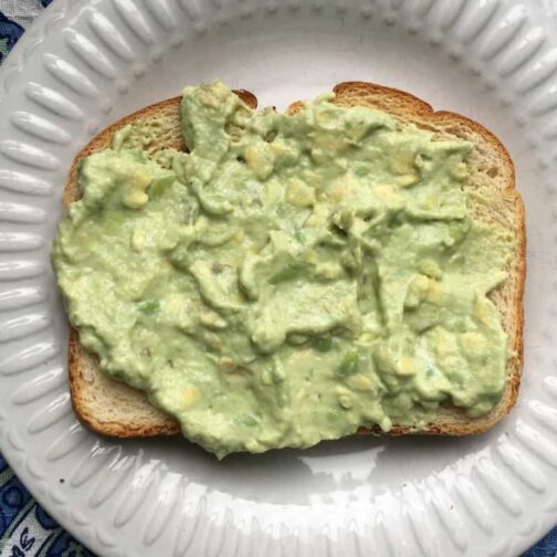avocado spread on a piece of toast