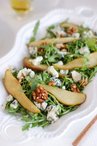 pear and blue cheese salad on a long white plate