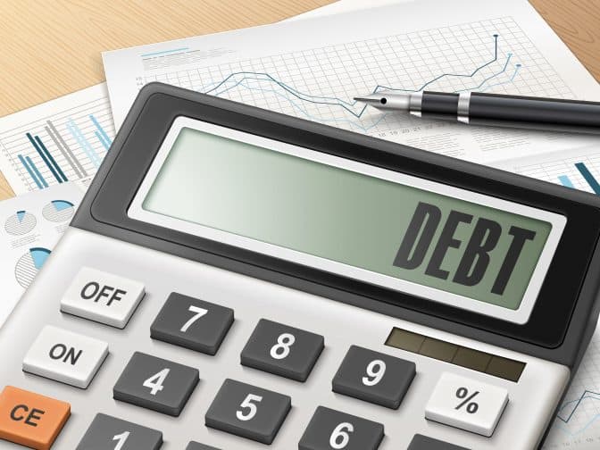 a calculator with the word debt on it to calculate all of your debt repayments