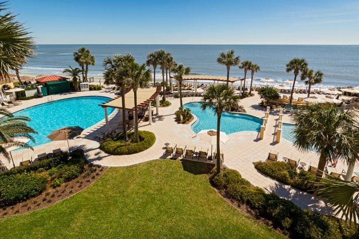 View of two pools from an Oceanfront Room at the King and Prince Resort