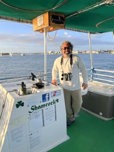 Boat with captain on the water 