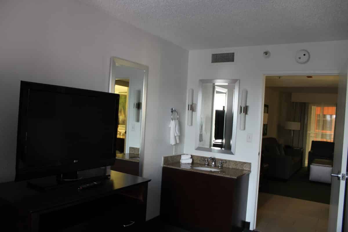 Thoughtful touches like the ensuite vanity area are what sets Embassy Suites Disney apart