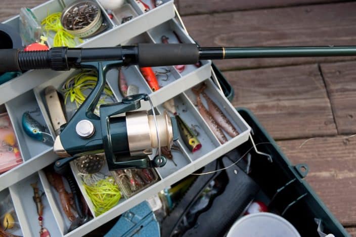 A tackle box with fishing gear and bait. Fishing adventure awaits when you visit Fort Pierce