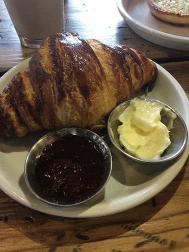 Commune's Honey Croissant is served with fresh butter and homemade jam
