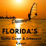 Discover Florida's Space Coast & Treasure Coast: Cocoa Beach: Man passing by with his windsurf or sailboard at sunset on a calm ocean against a spectacular vivid orange sky