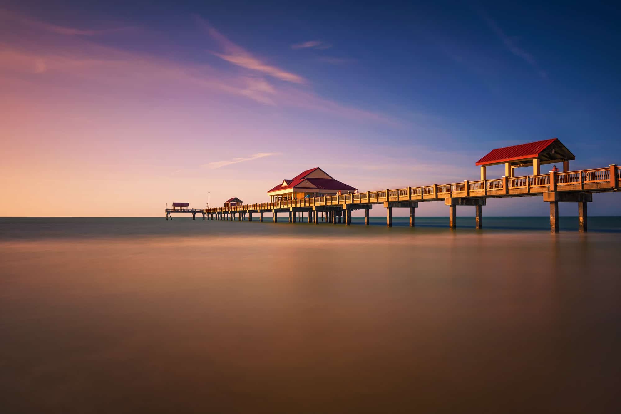 Pier 60 at sunset on a Clearwater Beach in Florida. Long exposure.