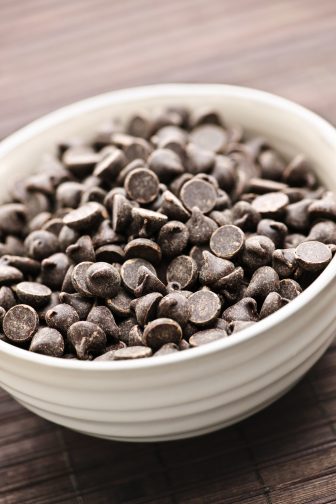 chocolate chips in a bowl for preparation of spiked hot cocoa