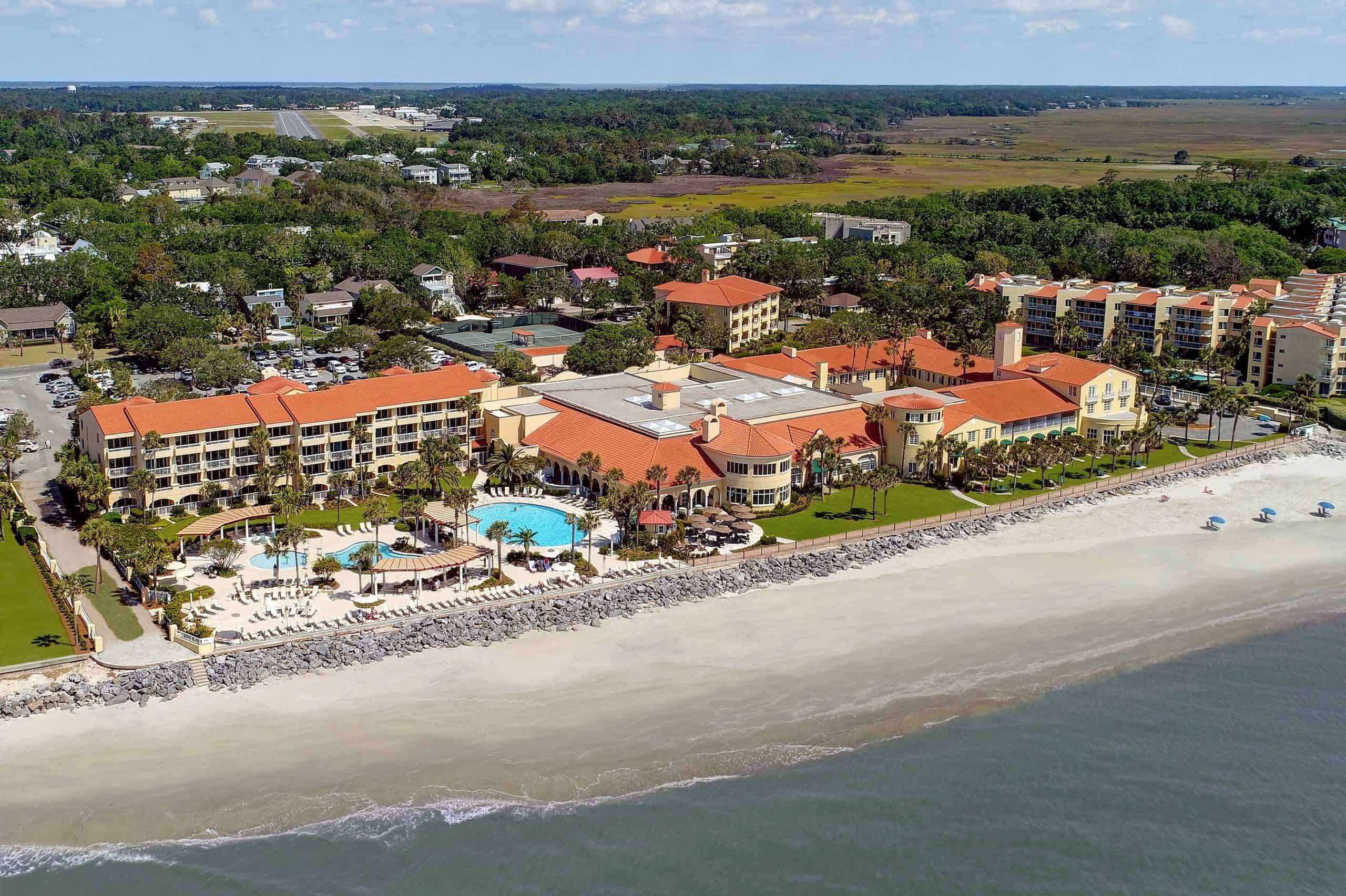 Aerial photo of the King and Prince with its standout red tile roofs. This mediterraen style coastal GA resort is perfect for weekend getaways