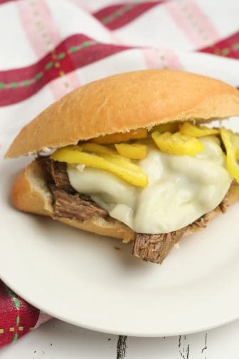 italian beef sandwich with cheese and peppers