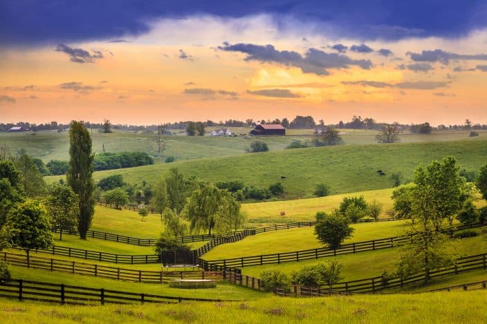 Kentucky bluegrass region as sunset, green rolling hills and farmland, a great place for an anniversary trip