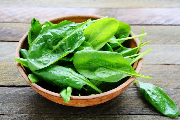 spinach in a bowl for use in a smoothie