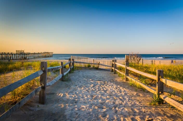 a path over sand dunes with to the beach on the jersey shore at sunrise, another family friendly destination