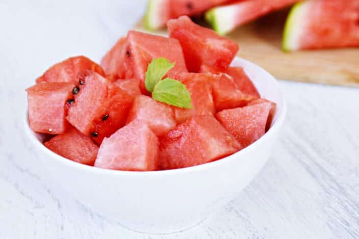 watermelon in a bowl for the making of watermelon feta salad