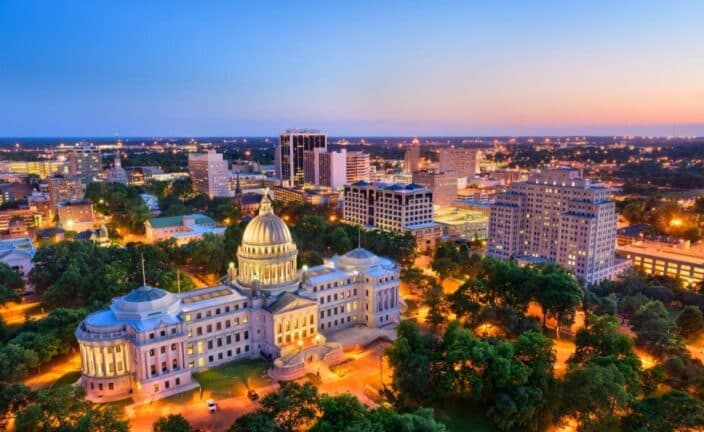a aerial view of Jackson Mississippi, at dusk with sunset skies one of the best south USA vacations for couples