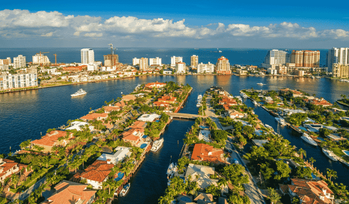 An aerial view of Fort Lauderdale with the intercoastal waterway, high rises, and homes. The ideal place for a Florida weekend getaway