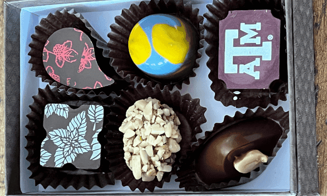 assorted fancy chocolates in a box from The Chocolate Gallery, an example of what you can get during a romantic Texas getaway