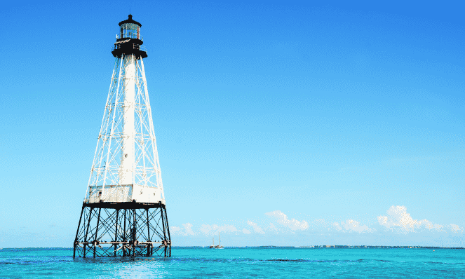Alligator Reef Lighthouse in the Florida keys with bright blue skies and water, the perfect place for snorkeling