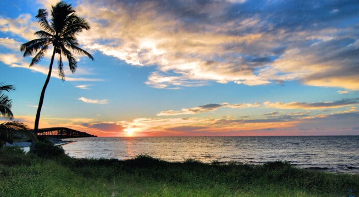 a sunset over a body of water