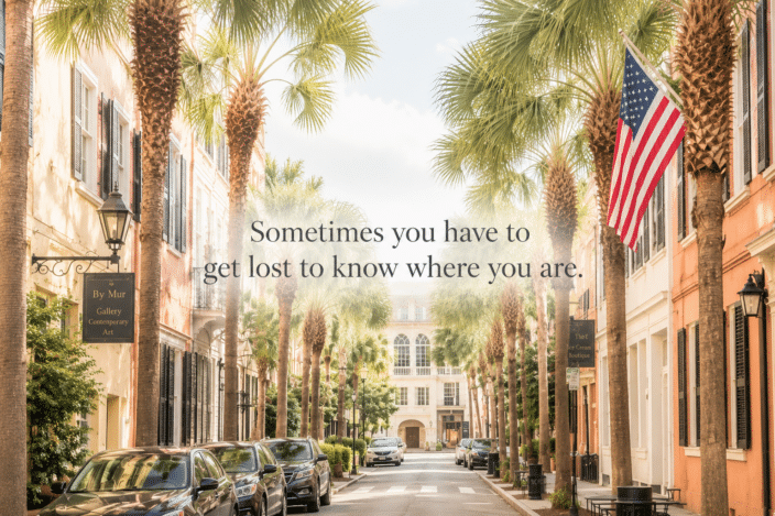Palm-lined street with inspirational quote.